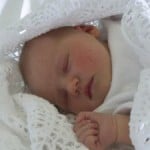 sleeping-baby-white-crochet-blanket-image
