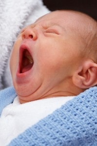 yawning-baby-blue-blanket-image