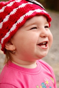 cute-baby-girl-red-white-hat-image