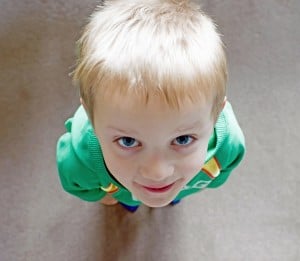 boy-green-shirt-looking-up-image