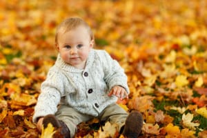 baby-in-fall-leaves-image