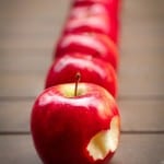 row-of-apples-bite-image