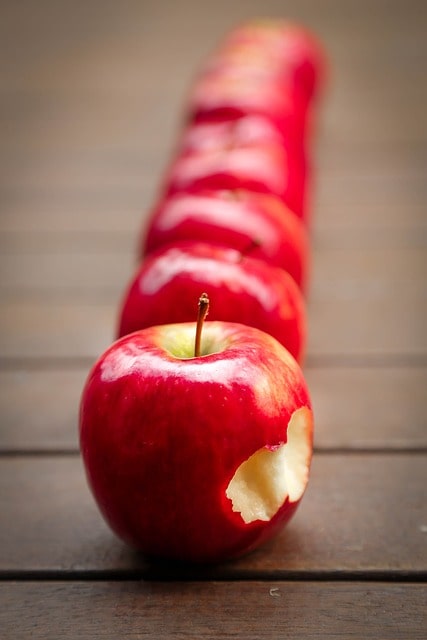 row-of-apples-bite-image
